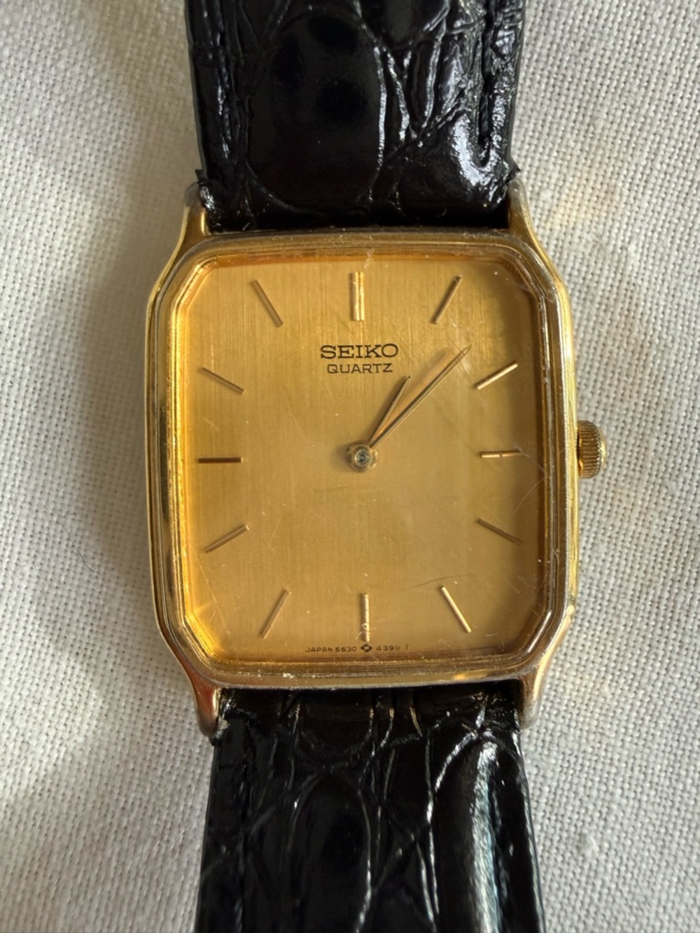 Vintage Seiko Gold Tone Square Dial Watch with Black Strap